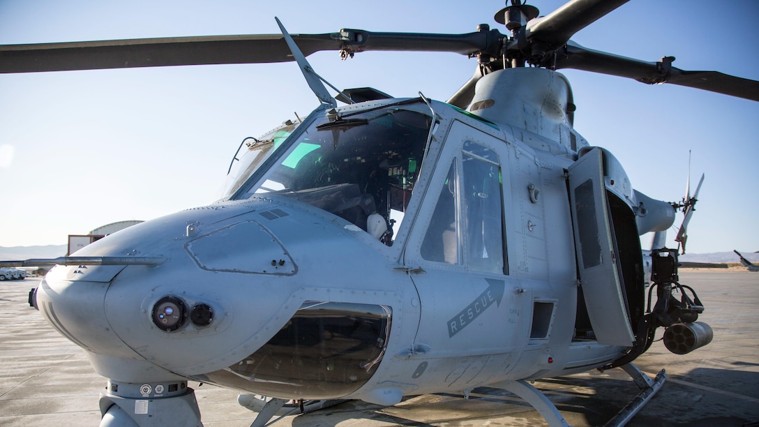U.S. Marines with Marine Light Attack Helicopter Squadron 167, Marine Air Ground Task Force 8 (MAGTF) conduct pre-operation flight checks on a UH-1Y Huey Helicopter before beginning a close air support drill during Integrated Training Exercise (ITX) 5-17 at Marine Corps Air Ground Combat Center, Twentynine Palms, Calif., July 21, 2017. The purpose of ITX is to create a challenging, realistic training environment that produces combat-ready forces capable of operating as an integrated MAGTF. (U.S. Marine Corps Photo by Sgt. Kassie L. McDole)