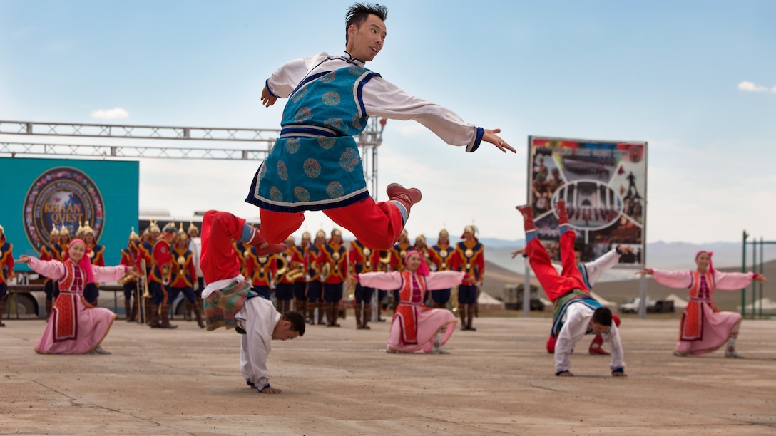 The Mongolian Military Dance and Song Ensemble perform traditional Mongolian dancing after the opening ceremony of Exercise Khaan Quest 2017 at Five Hills Training Area, Mongolia, July 23, 2017. Khaan Quest 2017 is a Mongolian-hosted, combined, joint training exercise designed to strengthen the capabilities of the U.S., Mongolia and other partner nations in international peacekeeping operations.(U.S. Marine Corps photo by Lance Cpl. Maximiliano Rosas)