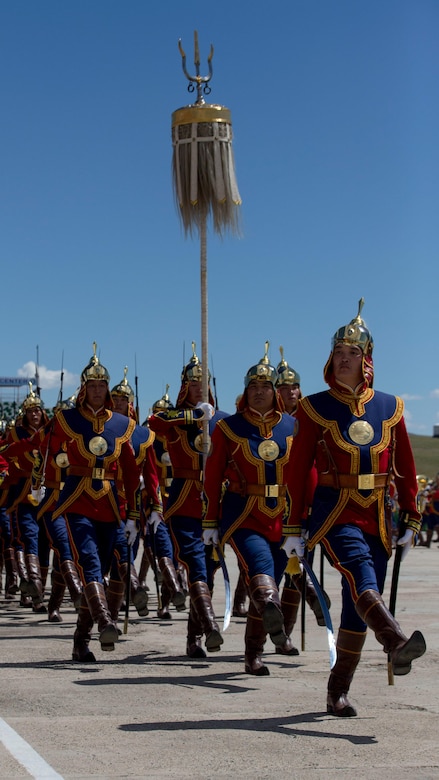 The Mongolian Armed Forces Honor Guard marches during the pass and review at the opening ceremony of Exercise Khaan Quest 2017, Five Hills Training Area, Mongolia, July 23, 2017. Khaan Quest 2017 is a Mongolian-hosted, combined, joint training exercise designed to strengthen the capabilities of the U.S., Mongolia and other nations in international peacekeeping operations. (U.S. Marine Corps photo by Lance Cpl. Charles Plouffe)