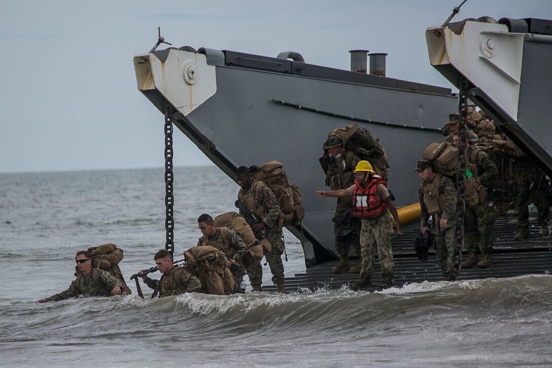 Marines and sailors with the 26th Marine Expeditionary Unit (Official Marine Corps Photo by Staff Sgt. Dengrier M. Baez/RELEASED)