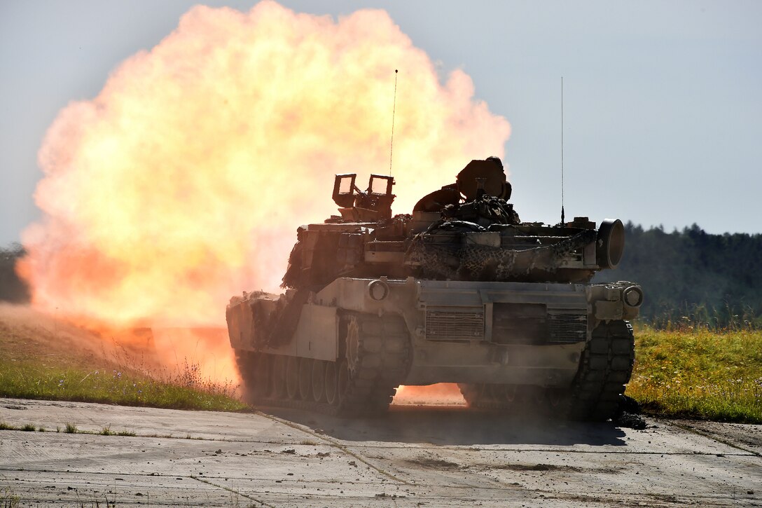 Soldiers fire a tank gun during training in Germany.