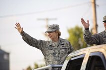 Maj. Gen. Carol Timmons, adjutant general of Delaware, waves to spectators during the Delaware State Fair’s Military Appreciation Day parade July 26, 2017, in Harrington, Del. Active duty, Reserve and Delaware Air National Guard Airmen and Delaware National Guard Soldiers marched in the parade. (U.S. Air Force photo by Capt. Bernie Kale)