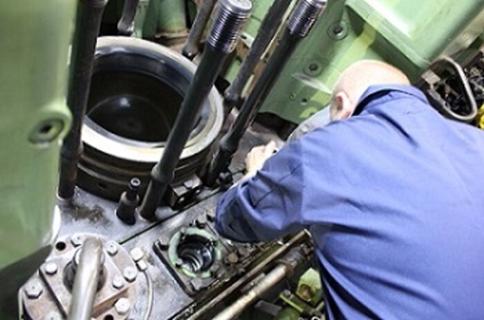 MK2 Jeff Bernard conducts repairs on the #3 Main Diesel Engine.