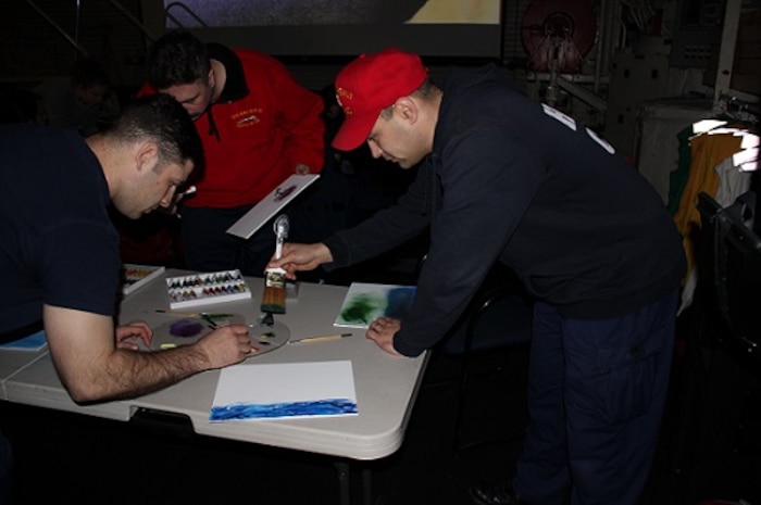 ETCS Brian Moller painting a masterpiece during the Morale paint-along.