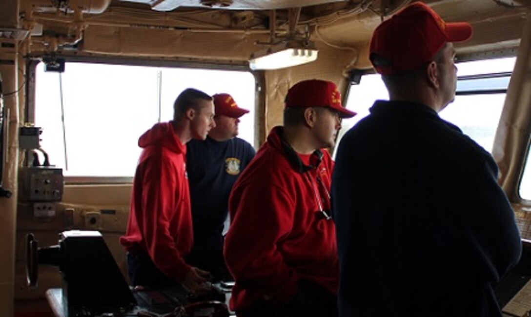 LTJG Nick Seleska conning from the science conning station.