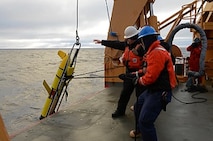 BMC John Lobherr supervises the deployment of a Sea Glider. 