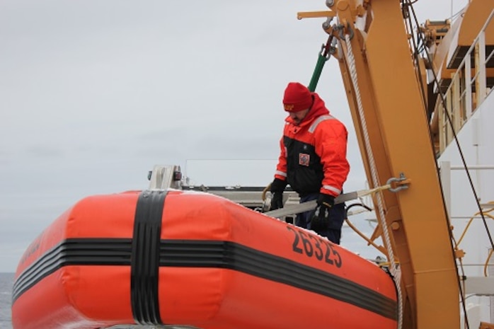 MK3 Aaron Key conducts boat checks. 