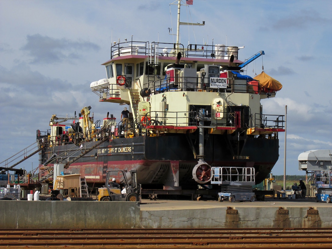 The Wilmington District's shallowdraft vessel MURDEN sits on the dry dock at the North Carolina Department of Transportation Shipyard at Mann's Harbor for general maintenance and repairs.  The District's Engineer Repair Yard crew and crew members of the MURDEN are performing the work. (USACE photo by Bill Harris)
