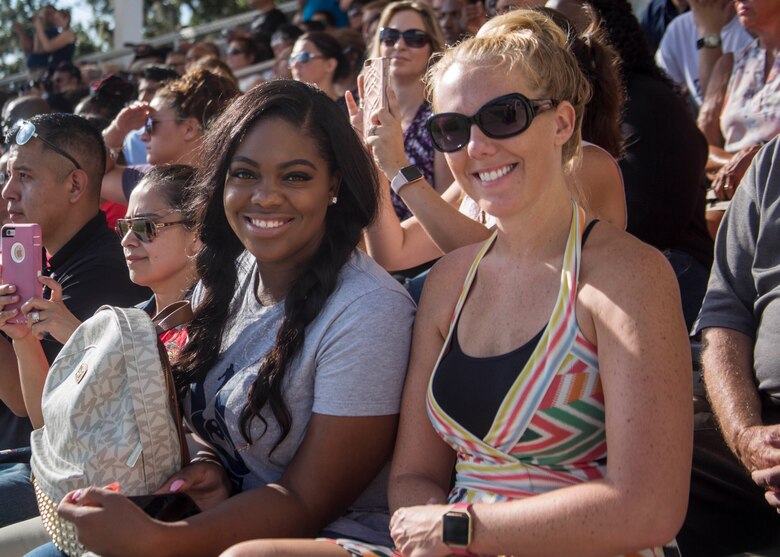 Spouses within 6th Marine Corps District (6MCD) pose for a photo at the graduation ceremony during the District Spouse Orientation Course (DSOC) aboard Marine Corps Recruit Depot (MCRD) Parris Island, South Carolina, July 28, 2017.  The DSOC provided Marines and their spouses a broad spectrum of tools to help them transition into the Marine Corps’ recruiting field. The spouses came from across the District to build connections and network with fellow spouses. (U.S. Marine Corps photo by Lance Cpl. Jack A. E. Rigsby)