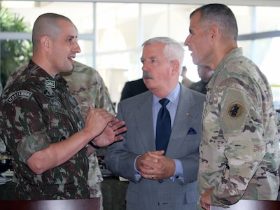 (From left) Sgt. Maj. Ricardo da Silva Vieira, general staff aide-de-camp; Joe Prasek, deputy of Army South operations; and Command Sgt. Maj. Carlos Olvera, Army South's senior enlisted leader; participate in army-to-army staff talks between Brazil and the U.S. July 24-26 in Brazilia, the country's capital. 