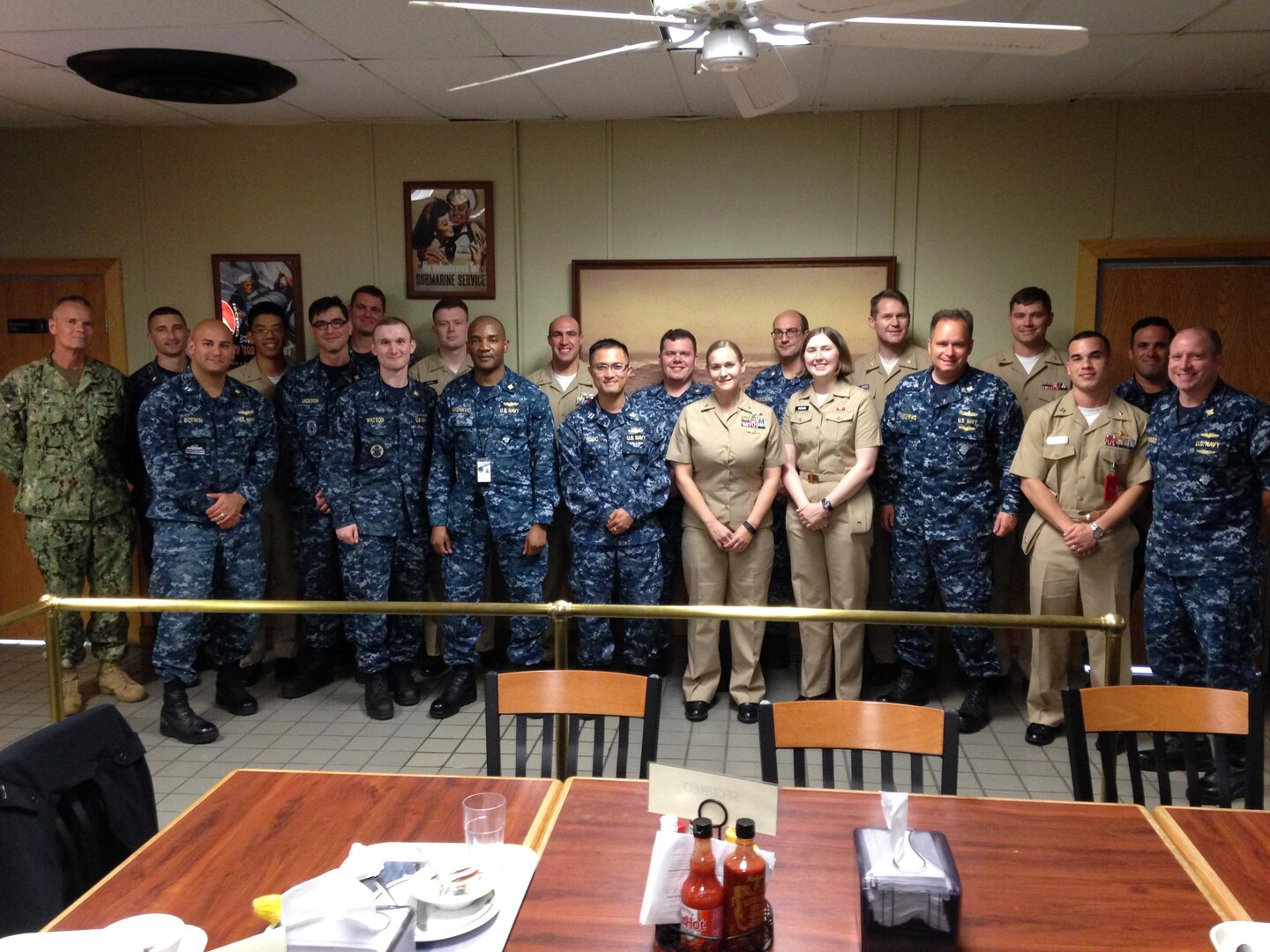 DLA Distribution Norfolk, Virginia, commander Navy Supply Corps Capt. Andrew Matthews and former DLA Distribution commander Navy Capt. Harry Thetford met with customers and several junior naval officers during a trip to Naval Submarine Base New London, Connecticut.