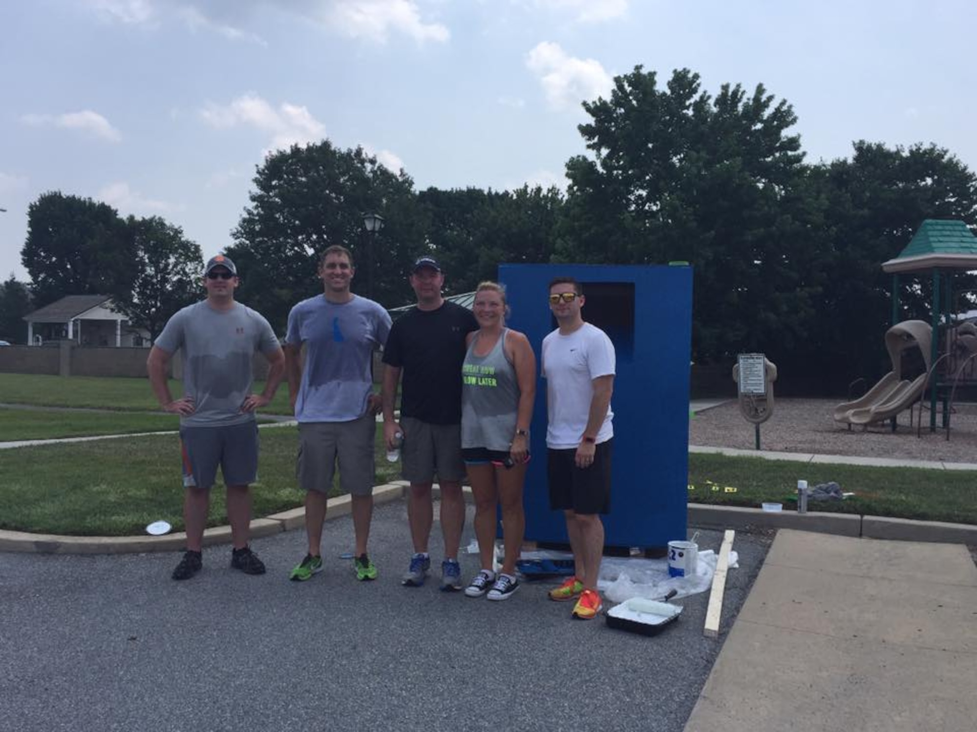 TSgt. Matt Davis, 436th Airlift Wing Public Affairs, Capt. Coy Incaprera, 436th AW Command Post, TSgt. Jerry Ivey, 436th AW CP, Leeann Ivey, spouse of TSgt. Ivey, and SSgt. Kyle Kubon, 436th AW CP, stand in front of one of the Airmen’s Attic donation boxes July 20, 2017, on Dover AFB, Del. The boxes will be used to help the Airmen’s Attic get donations and make dropping off more convenient for base residents. “We built them to help the airmen's attic get donations. The problem was that with their hours, people had a hard time getting donations to them,” said Ivey. “There were donation boxes in housing, but they were for good will. I thought if we could give to people off base we should be able to take care of our own.”