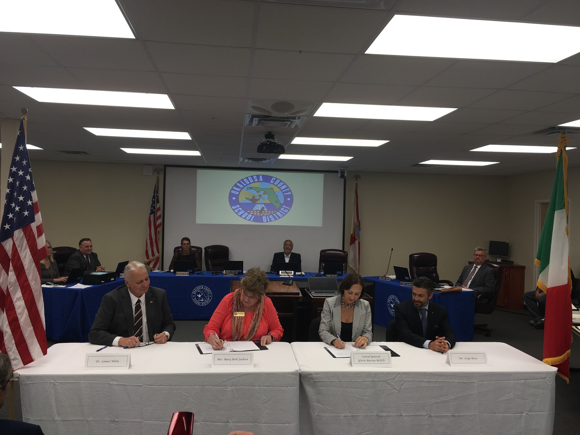 Italian Consul General Maria Ballelli, members of Organization for the Development of Italian Language and the Okaloosa County School District sign a memorandum of understanding April 10, 2017, at Niceville, Fla. (Courtesy Photo)