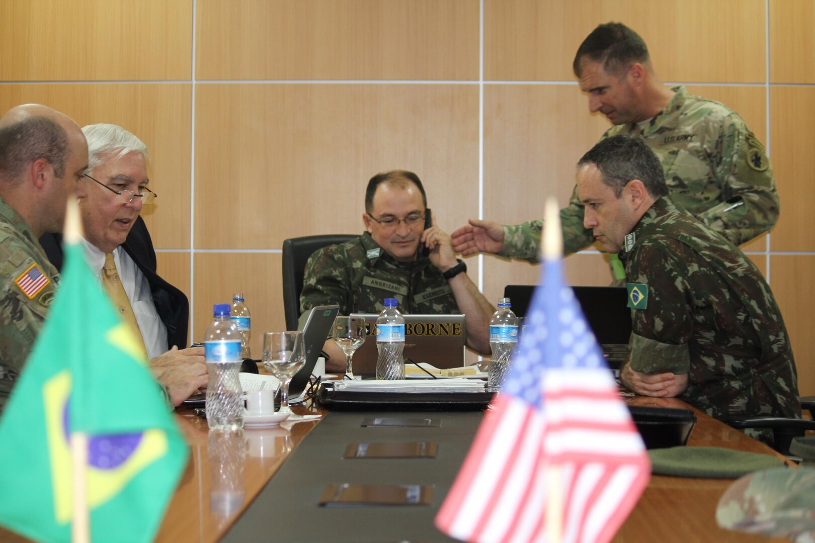 U.S. and Brazilian delegates participate in a work group July 24. Topics were broken out for further discussion such as personnel issues, logistics, engineering, science and technology, medical, international affairs, doctrine, training and operations, command and control, cyber, electronic warfare and intelligence, among others.