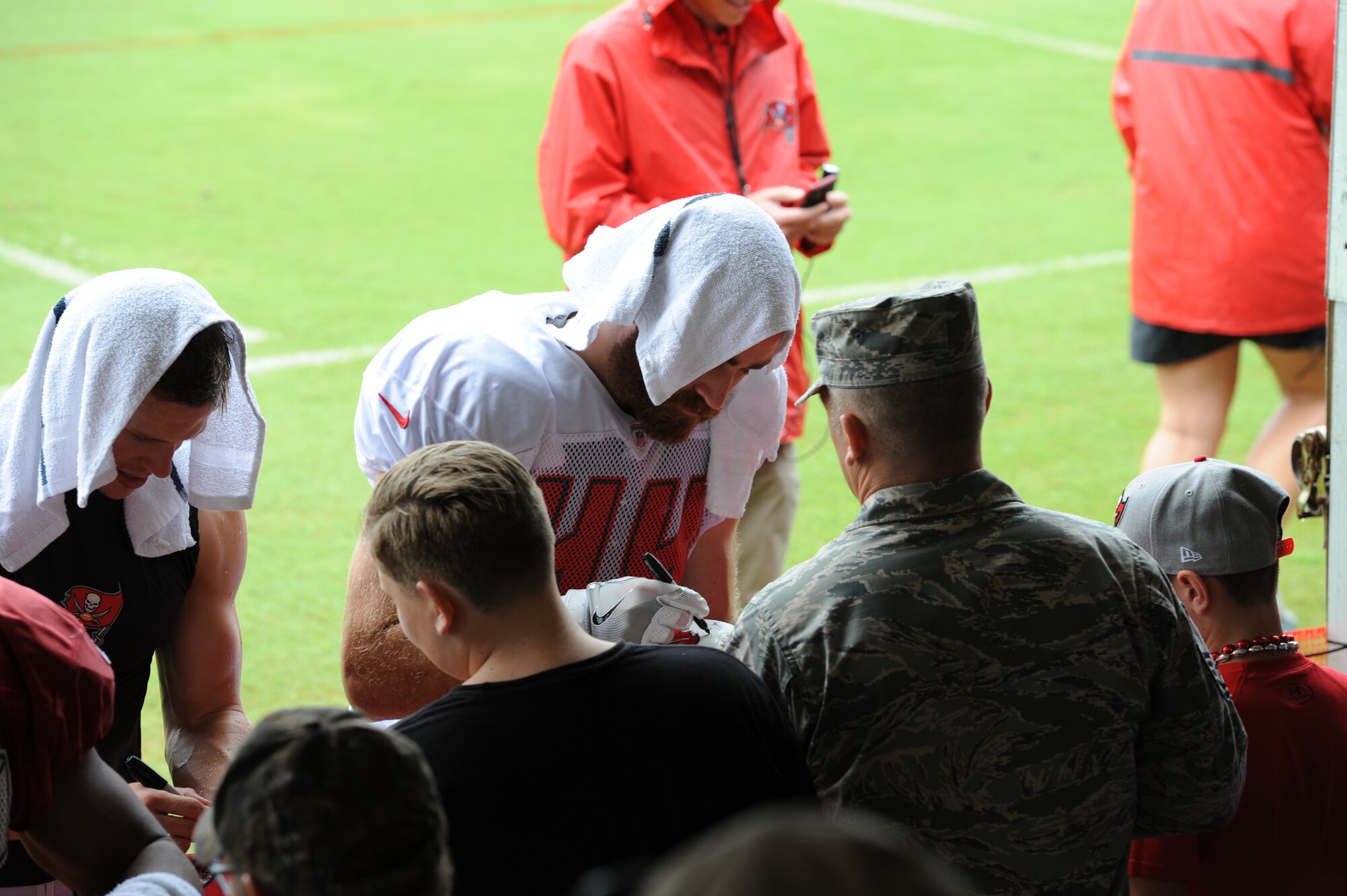 The season’s first pads-on day at the Tampa Bay Buccaneers Training Camp, was no ordinary day at One Buc Place, Tampa, Florida, July 31, 2017. Instead of the bleachers filled with your traditional fans, Airmen from the 927th Air Refueling Wing along with other military members from MacDill Air Force Base, Florida showed up in force to cheer on their hometown team, the Tampa Bay Buccaneers. (U.S. Air Force Photo by TSgt. Peter Dean) 