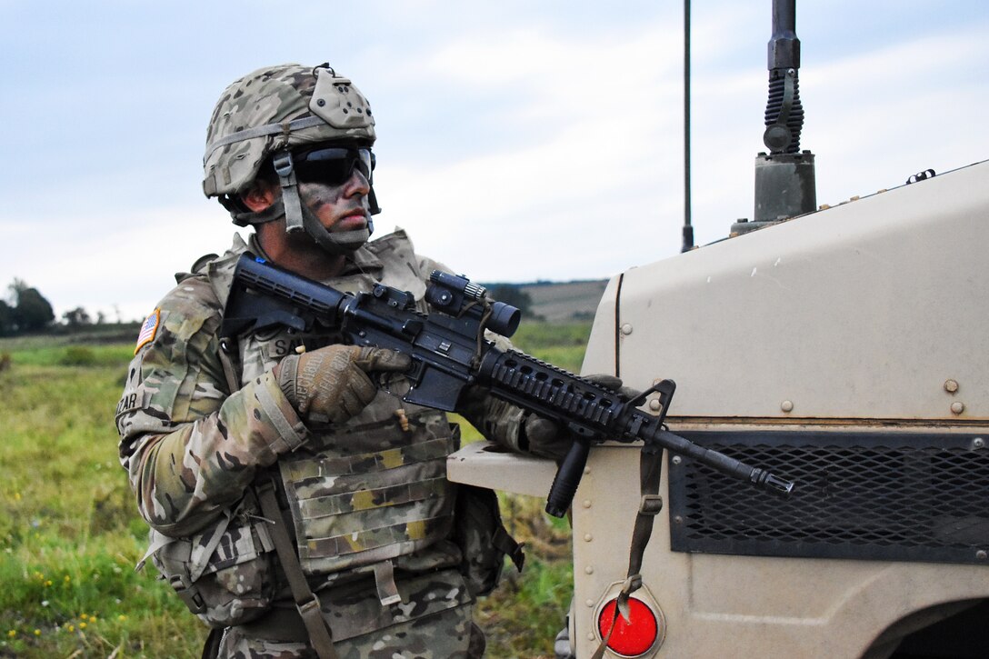 A U.S. soldier provides security before a heavy weapons live-fire exercise.