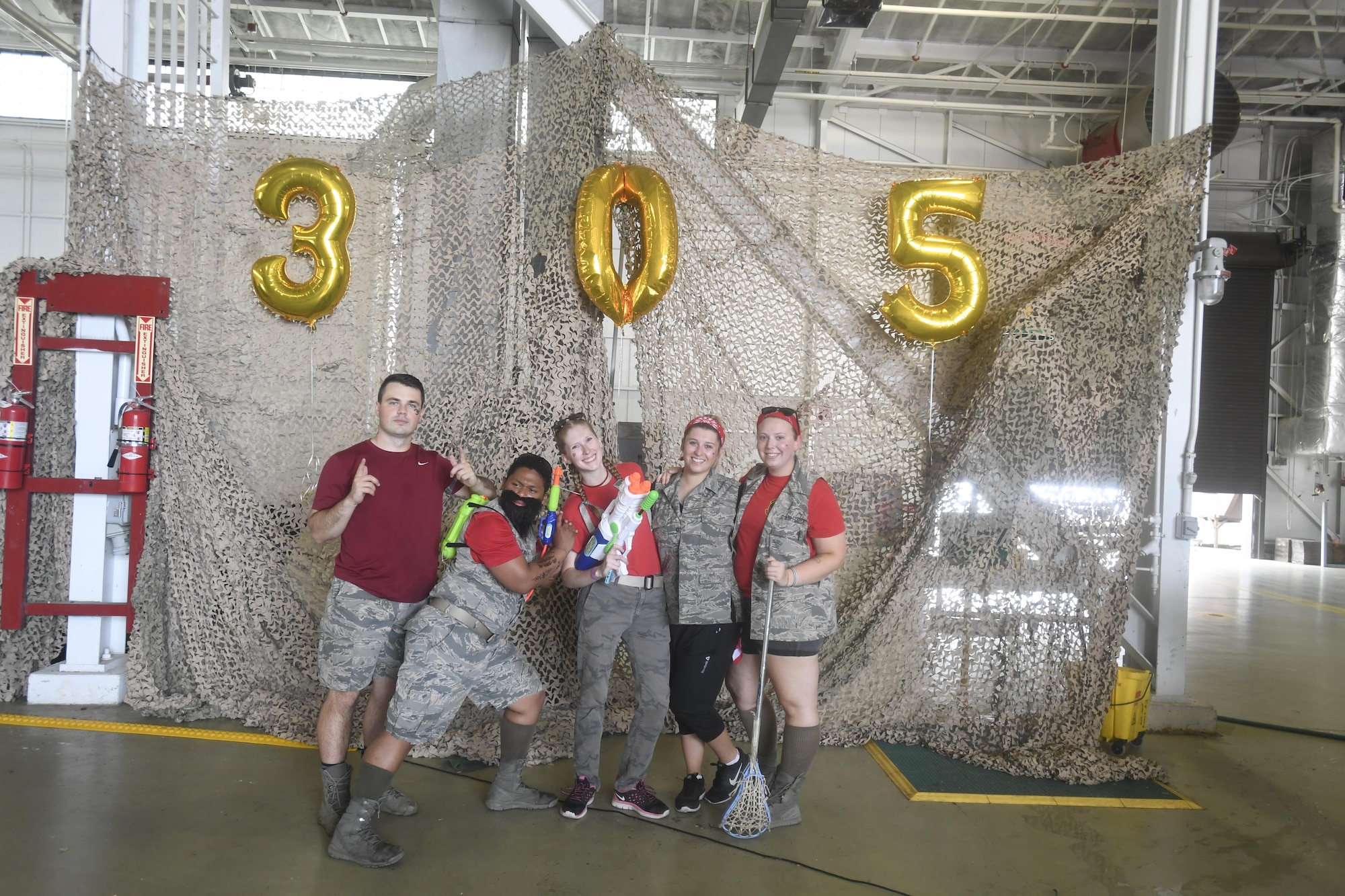 Airmen with the 305th Air Mobility Wing attend a combat dining-out at Joint Base McGuire-Dix-Lakehurst, New Jersey, July 28, 2017. A combat dining-out is an informal event where Airmen can have the opportunity to let loose and enjoy each other's company. 