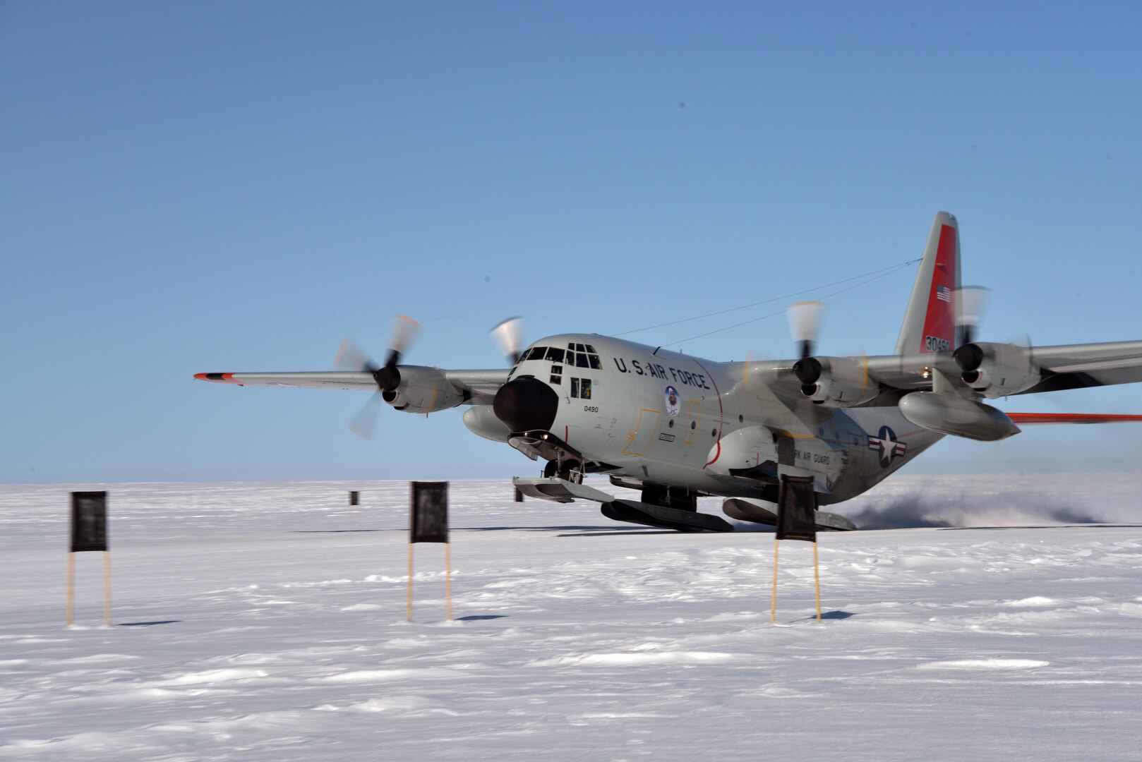 An LC-130 "Skibird" from the New York Air National Guard's 109th Airlift Wing based out of Stratton Air National Guard Base, Scotia, New York, takes off from a forward airfield known as Raven Camp near Kangerlussuaq, Greenland July 28, 2017. Raven Camp is used to train aircrews on LC-130 operations on skiways. 