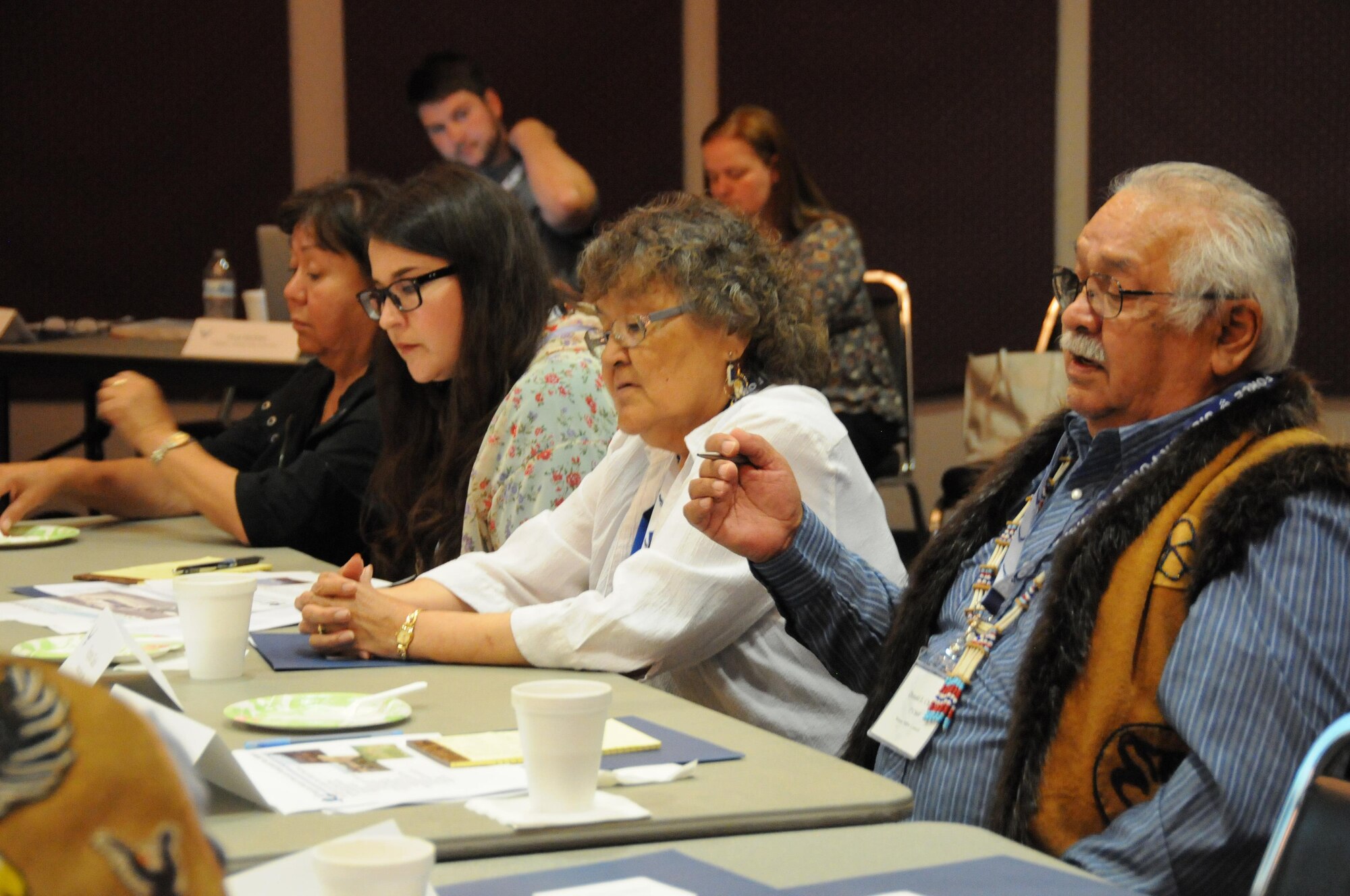 EIELSON AIR FORCE BASE, Alaska —1st Chief Donald Charlie, Nenana Native Council, flanked by his wife Virginia Charlie, and Council members Jessica Shaw and Jeri Knabe, provided opening remarks on behalf of the Council, during the tribal relations meeting held at Clear Air Force Station, Alaska, July 12, 2017. Charlie remarked how the meeting between the Air National Guard and Air Force leaders from Clear was a historical event, one that he could not in recent memories remember ever occurring. (U.S. Air National Guard photo by Airman 1st Class Amber Bowers/Released)
