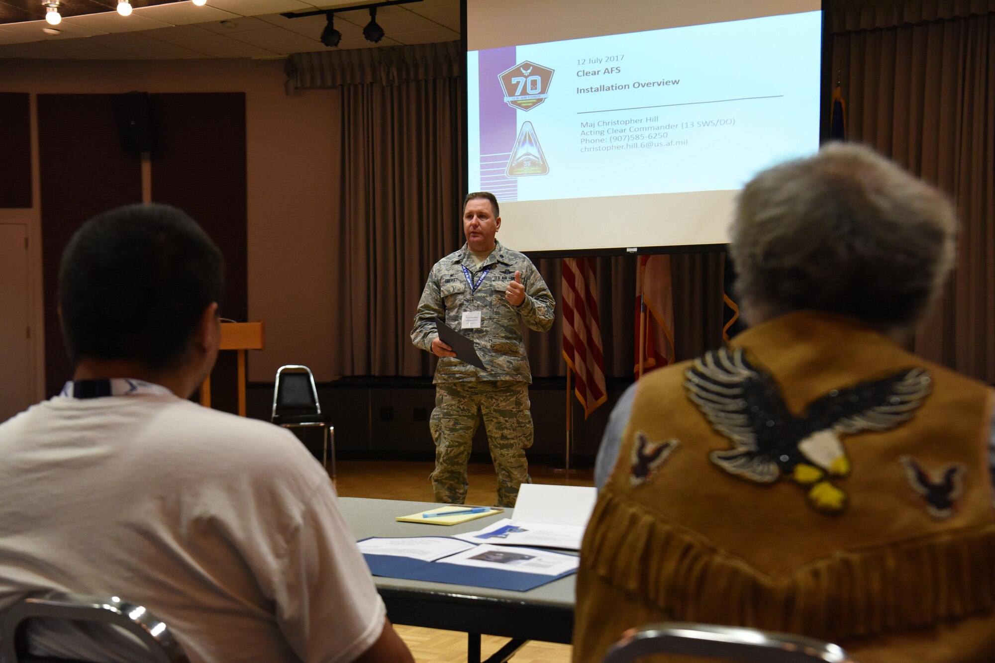 EIELSON AIR FORCE BASE, Alaska — Kane Evan and Victor Lord, members of the Nenana Native Council, Nenana, Alaska, listen as Lt. Col. John Oberst, commander 213th Space Warning Squadron, Clear Air Force Station, Alaska, welcomes the members of the Council to a tribal relations meeting at Clear, July 12, 2017. Evan and Lord, along with several other members of the Nenana Native Council, were invited to the meeting by Air Force and Air National Guard personnel in order to reestablish relations with the Alaskan Natives. (U.S. Air National Guard photo by Senior Master Sgt. Paul Mann/Released)