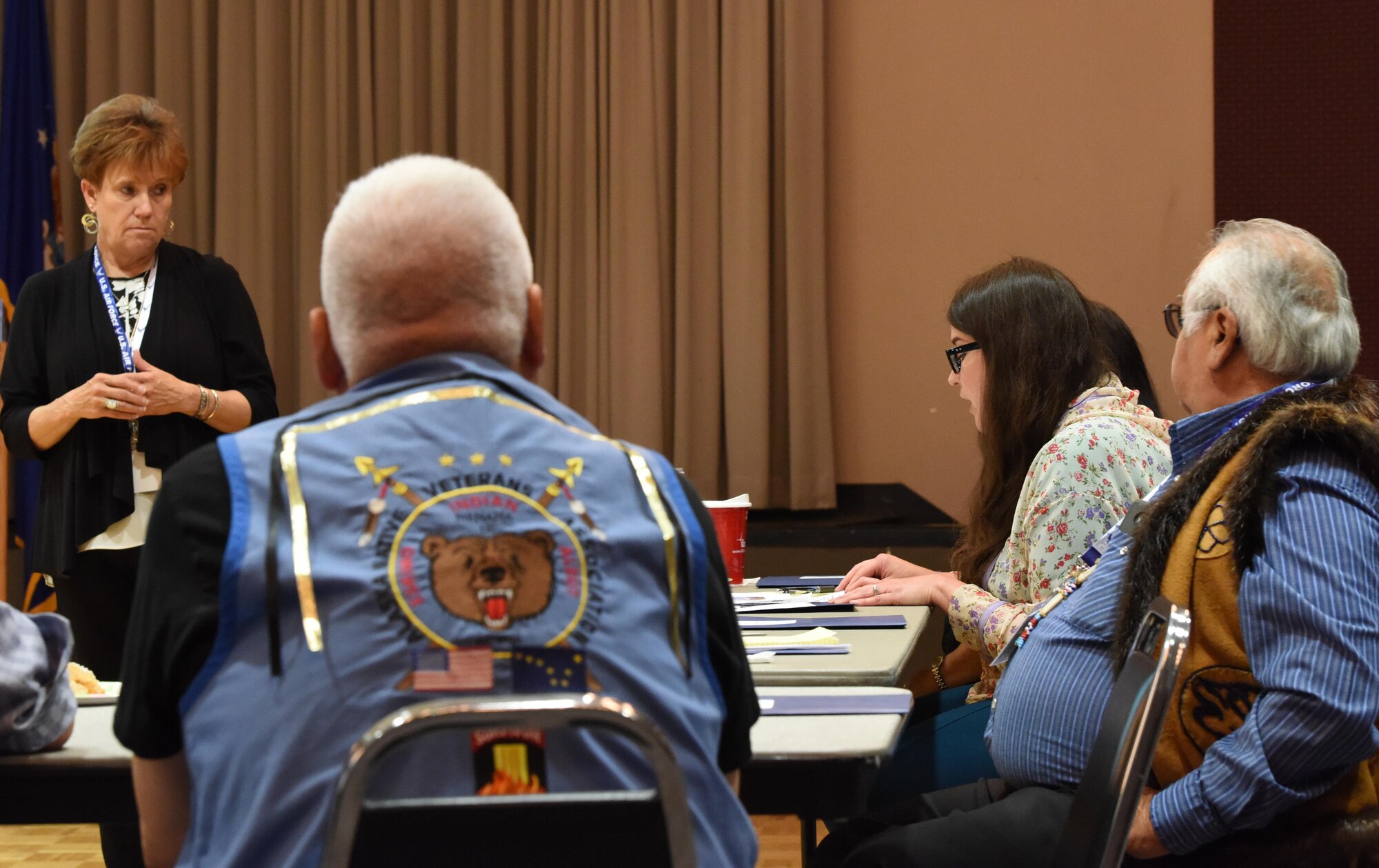 EIELSON AIR FORCE BASE, Alaska — Pamela Miller, Cultural Resources Media Manager for the Air Force Civil Engineer Center, Peterson AFB, Colorado, listens as Jessica Shaw from the Nenana Native Council, Nenana, Alaska, shares some of the possible cultural and community activities that the two governments could participate in together, during a tribal relations meeting at Clear Air Force Station, Alaska, July 12, 2017. Miller and several other members of the AFCEC, along with personnel from Clear and members of NNC, held the meeting and had lunch together at the interior-Alaska base to help reestablish relations between the neighboring communities. (U.S. Air National Guard photo by Senior Master Sgt. Paul Mann/Released)