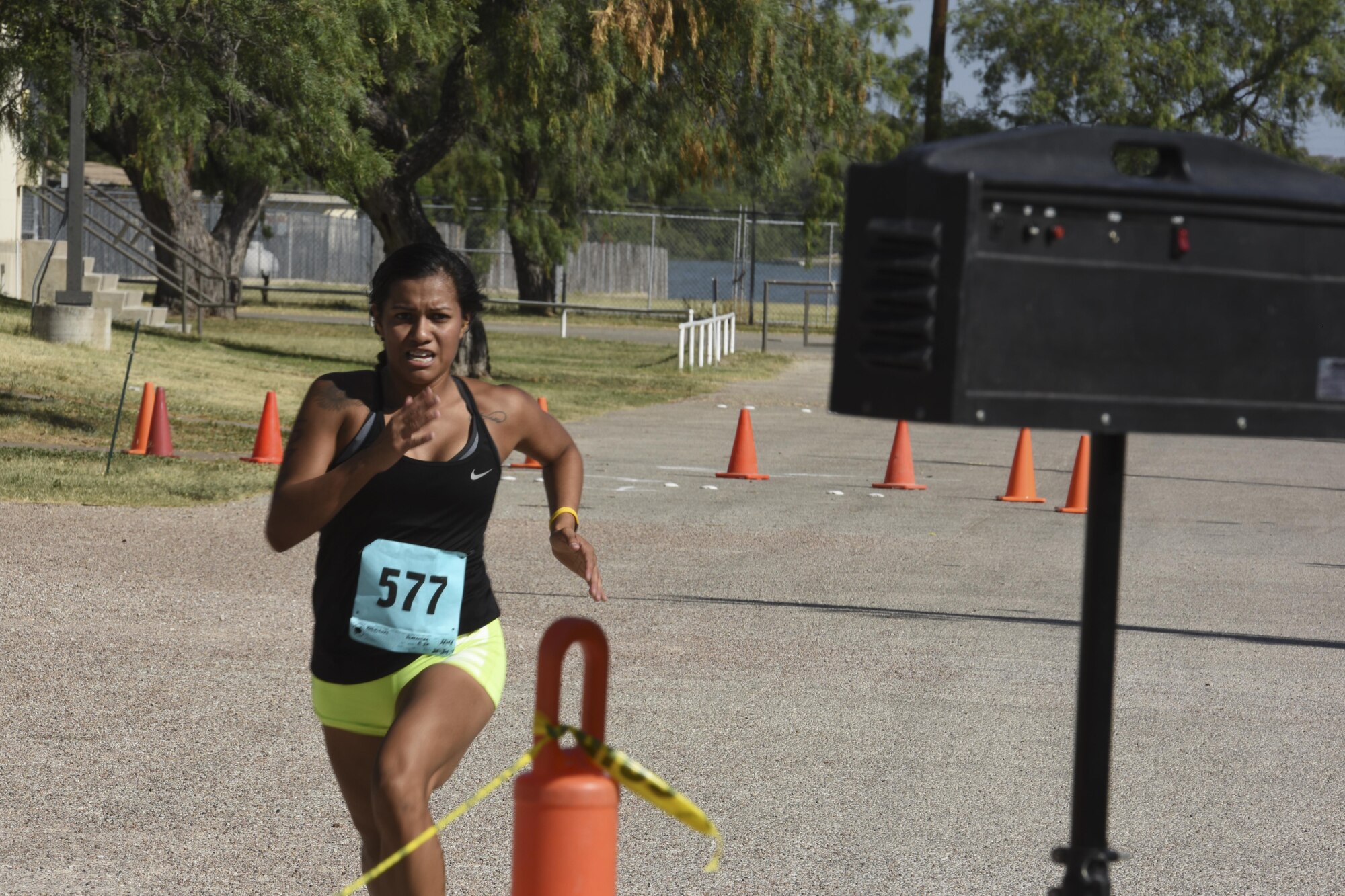 Alexandra Rodriguez pushes to the finish at the 17th Force Support Squadron’s Annual Sprint Triathlon on July 29, 2017, at the Goodfellow recreational camp, in San Angelo, Texas. Rodriguez competed in the 20 to 24 age category. (U.S. Air Force Photo by Amn Zachary Chapman/Released)