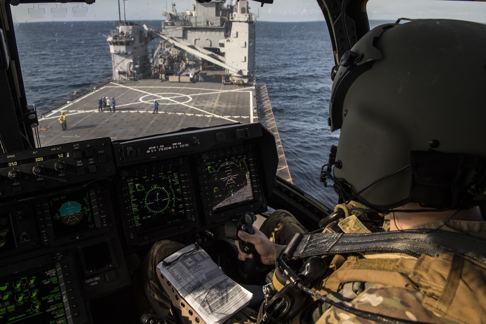 A pilot with the 8th Special Operations Squadron maneuvers a CV-22 Osprey tiltrotor aircraft onto the amphibious dock landing ship USS Oak Hill (LSD 51) during a deck landing qualification flight off the coast of Virginia, July 25, 2017. The 8th SOS conducts deck landings four to six times a year to ensure aircrews are qualified, current and ready to conduct global operations any time, any place. (U.S. Air Force photo by Airman 1st Class Joseph Pick)