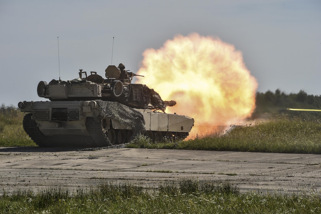 Soldiers conduct a live-fire exercise with M1A2 Abrams tanks at the 7th Army Training Command’s Grafenwoehr Training Area, Germany, July 31, 2017. The soldiers are assigned to the 4th Infantry Division's Company A, 1st Battalion, 68th Armor Regiment, 3rd Armored Brigade Combat Team. Army photo by Gertrud Zach 