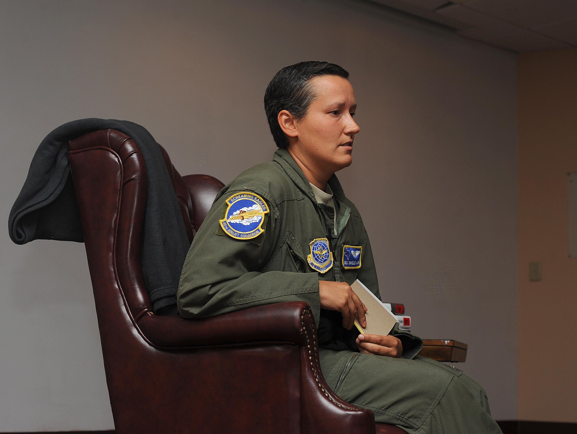 U.S. Air Force Staff Sgt. Danielle Galich, 40th Airlift Squadron C-130J Hercules loadmaster, speaks about her stuggle with breast cancer and her drunk driving incident at the Dyess Storytellers event at Dyess Air Force, Texas on July 27, 2017. Galich explains how she got through her struggles with stage-two breast cancer by having inner strength and resiliency. (U.S. Air Force photo by Airman Kylee Thomas)