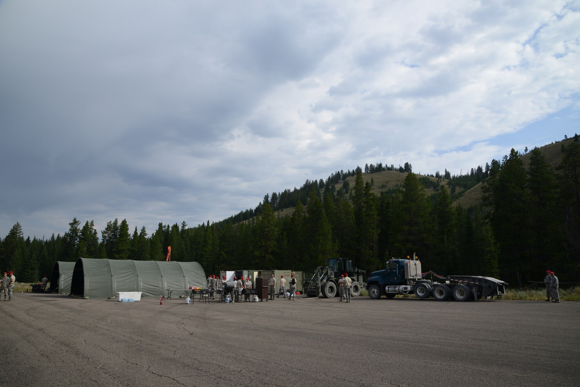 Airmen from the 819th RED HORSE Squadron set up a mess hall for lunch during an exercise July 27, 2017, at the Benchmark Airport near Augusta, Mont.