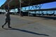 U.S. Air Force Tech. Sgt. Joshua Martin, 20th Maintenance Group maintenance quality assurance (QA) technician, walks along the flightline at Shaw Air Force Base, S.C., Aug. 1, 2017. Airmen assigned to QA are tasked with inspecting the work of all maintenance career fields, ensuring Airmen are performing tasks correctly and proficiently. (U.S. Air Force photo by Senior Airman Christopher Maldonado)