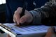 U.S. Air Force Tech. Sgt. Joshua Martin, 20th Maintenance Group maintenance quality assurance technician, fills out a routine inspection checklist at Shaw Air Force Base, S.C., Aug. 1, 2017. Routine inspections consist of key task listings and personnel evaluations, all intended to enhance workflow on flightline operations.  (U.S. Air Force photo by Senior Airman Christopher Maldonado)
