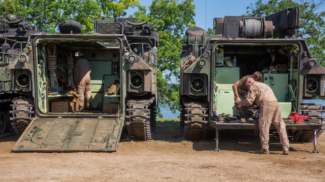 U.S. Marines with Bravo Company, 4th Amphibious Assault Battalion, 4th Marine Division, Marine Forces Reserve, work on Amphibious Assault Vehicles at Camp Grayling, Michigan, during exercise Northern Strike 2017, July 31, 2017. Northern Strike 2017 brought together Reserve Marine from across the country to provide realistic combined arms trainings to cover a spectrum of combat scenarios.