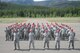 Airmen from the 819th RED HORSE Squadron pose for a group photo during an exercise July 27, 2017, at the Benchmark Airport near Augusta, Mont. The Airmen flew in a C-130 Hercules aircraft from the 120th Airlift Wing, Montana Air National Guard, to an air strip in the mountains to practice a short-notice deployment and bare base build up. (U.S. photo by Staff Sgt. Delia Martinez)