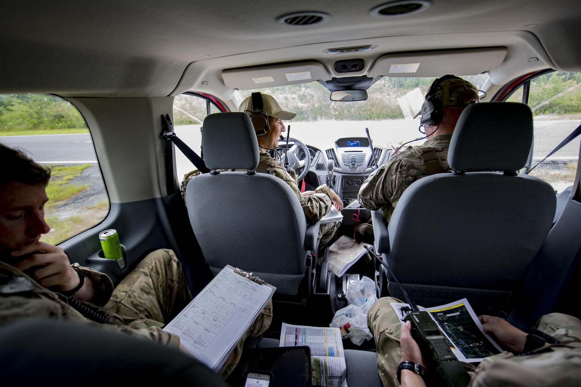 U.S. Air Force and Royal Air Force joint terminal attack controllers communicate with 23d Fighter Group A-10C Thunderbolt IIs overhead during a close air support training exercise, July 26, 2017, in Lakeland, Ga. Two RAF members recently spent time with the 93d Air Ground Operations Wing to compare and contrast how each entity conducts business and to plan future coalition training events. (U.S. Air Force photo by Airman 1st Class Daniel Snider)