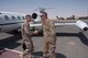 Chief Master Sgt. John Montgomery, U.S. Air Forces Central Command command chief (left), is greeted by Chief Master Sgt. Timothy Pachasa, the 386th Air Expeditionary Wing Command Chief, Monday July 31, 2017, on the flightline at an undisclosed location in Southwest Asia.(U.S. Air Force photo by Master Sgt. Eric M. Sharman)