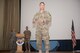 Chief Master Sgt. John Montgomery, U.S. Air Forces Central Command command chief, addresses the airmen of the 386th Air Expeditionary Wing during a commanders call Monday July 31, 2017, at an undisclosed location in Southwest Asia. (U.S. Air Force photo by Master Sgt. Eric M. Sharman)