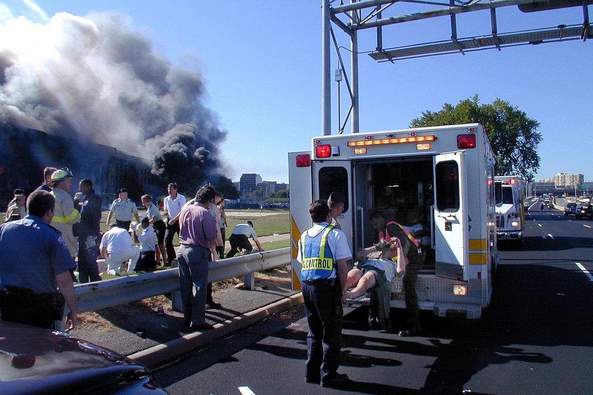Medical personnel load the injured onto an ambulance near the Pentagon.