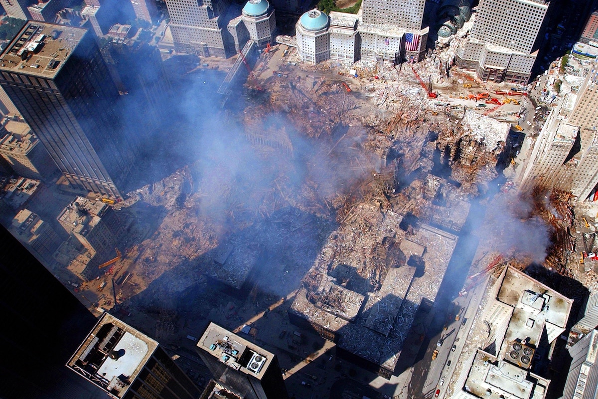 An aerial view shows the damage and smoke from ground zero.