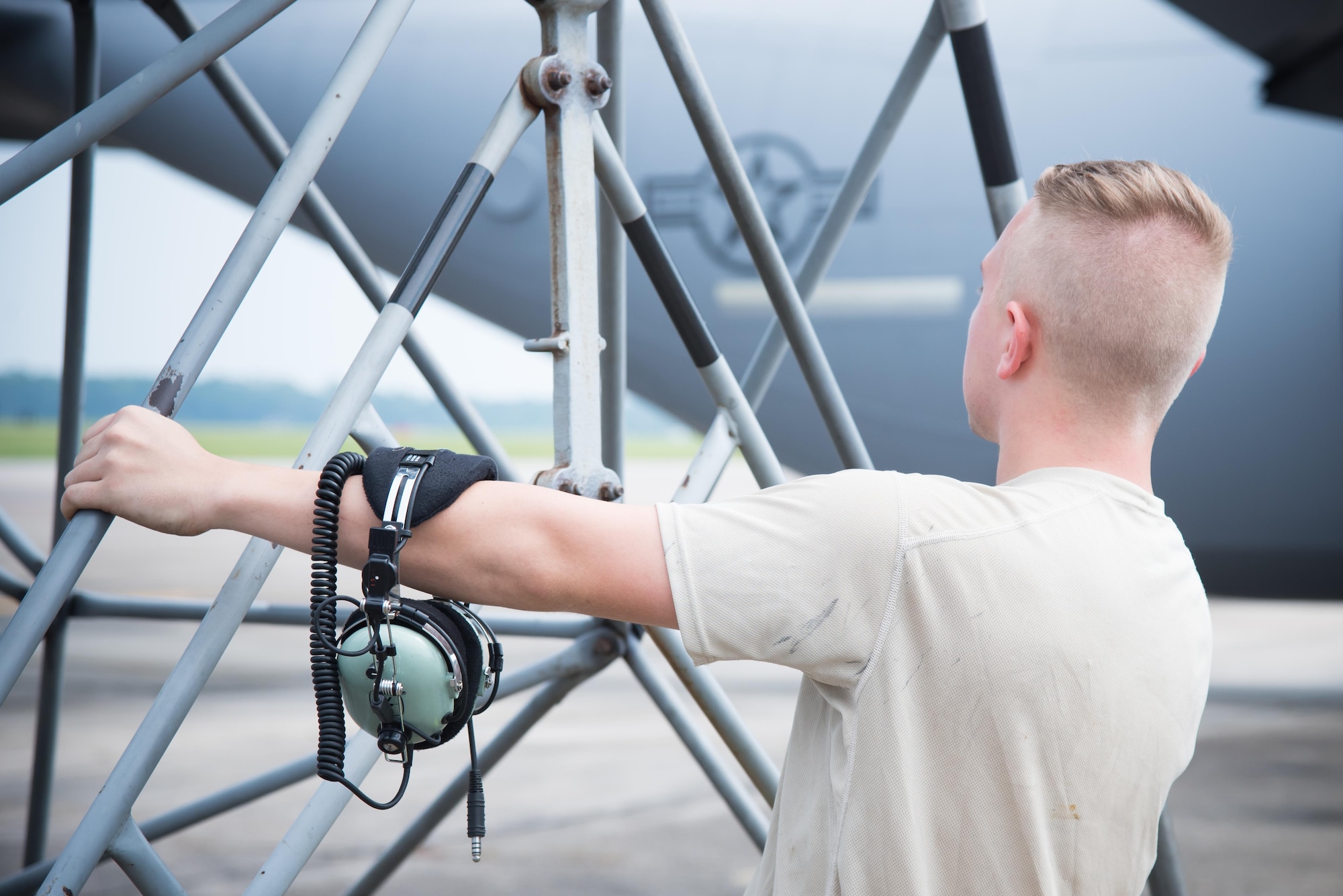 Senior Airman Jacob Henson, 913th Maintenance Squadron crew chief from Little Rock Air Force Base, Arkansas, moves a B-5 stand July 21, 2017 at Keesler AFB, Mississippi. (U.S. Air Force photo/Staff Sgt. Heather Heiney)