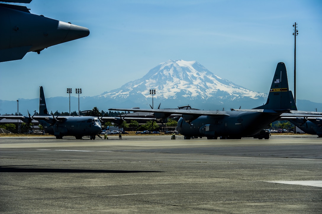Aircraft that will fly sorties during the multinational exercise Mobility Guardian sit on the flight line on Joint Base Lewis-McChord August 1, 2017. A heat wave is forecasted for the beginning of the exercise, where temperatures may exceed 100 degrees.