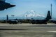Aircraft that will fly sorties during the multinational exercise Mobility Guardian sit on the flight line on Joint Base Lewis-McChord August 1, 2017. A heat wave is forecasted for the beginning of the exercise, where temperatures may exceed 100 degrees. (U.S. Air Force photo/SSgt. Daniel Liddicoet)