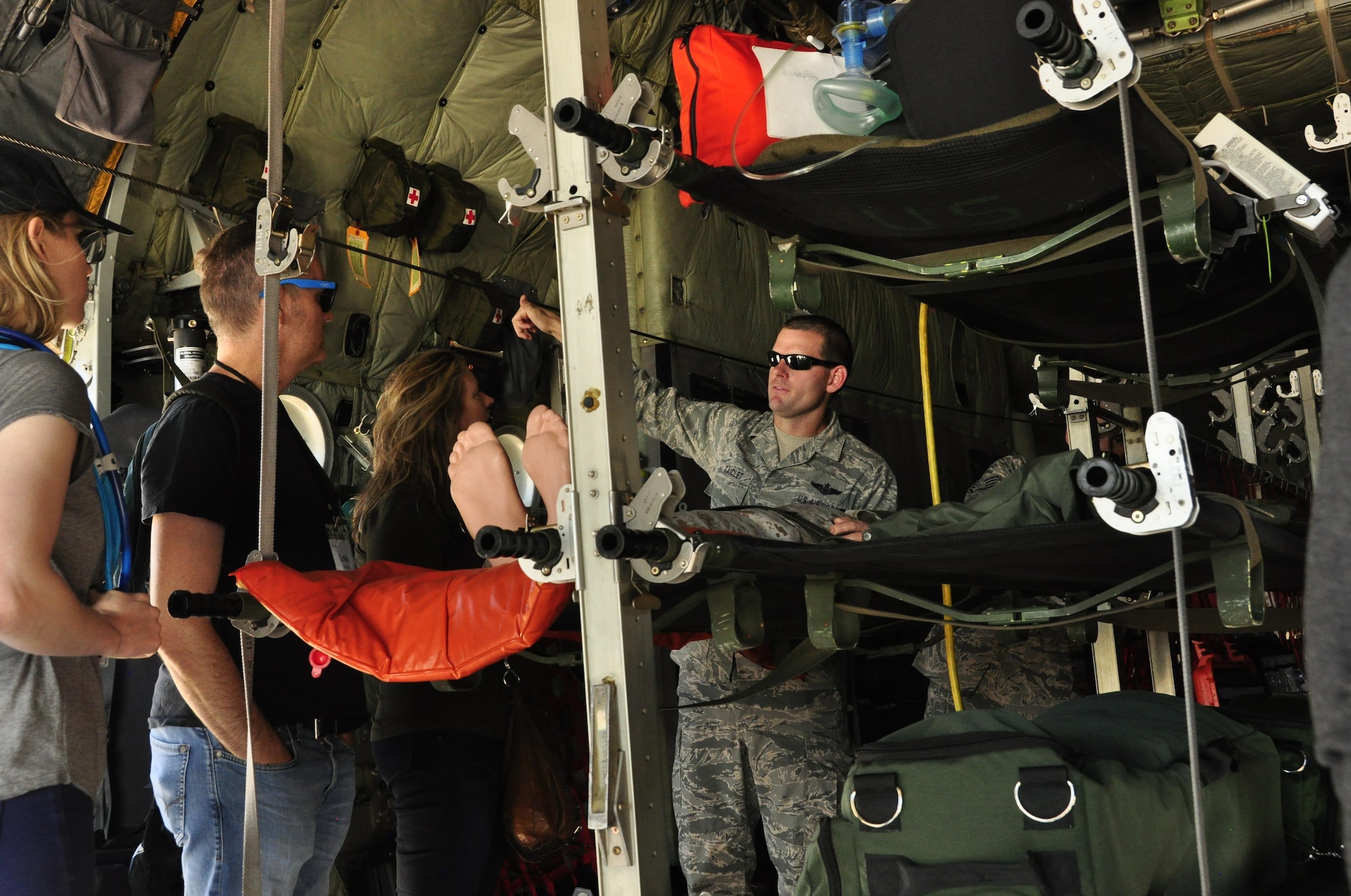 Representatives of various entertainment offices out of Los Angeles separated into various groups learn about the 302nd Airlift Wing and its Reserve missions involving C-130 Hercules aircraft at Peterson Air Force Base, Colo., July 18, 2017.
