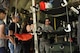 Senior Master Sgt. Gary Taiclet, the 34th Aeromedical Evacuation Squadron superintendent, explains the mission of his squadron to representatives of various entertainment offices out of Los Angeles on board a 302nd Airlift Wing C-130 Hercules at Peterson Air Force Base, Colo., July 18, 2017. The entertainment representatives toured bases in the Pikes Peak Region to see the vital role Space Command plays in the nation’s defense and encourage Air Force storytelling in the entertainment industry. (U.S. Air Force photo/Staff Sgt. Frank Casciotta)