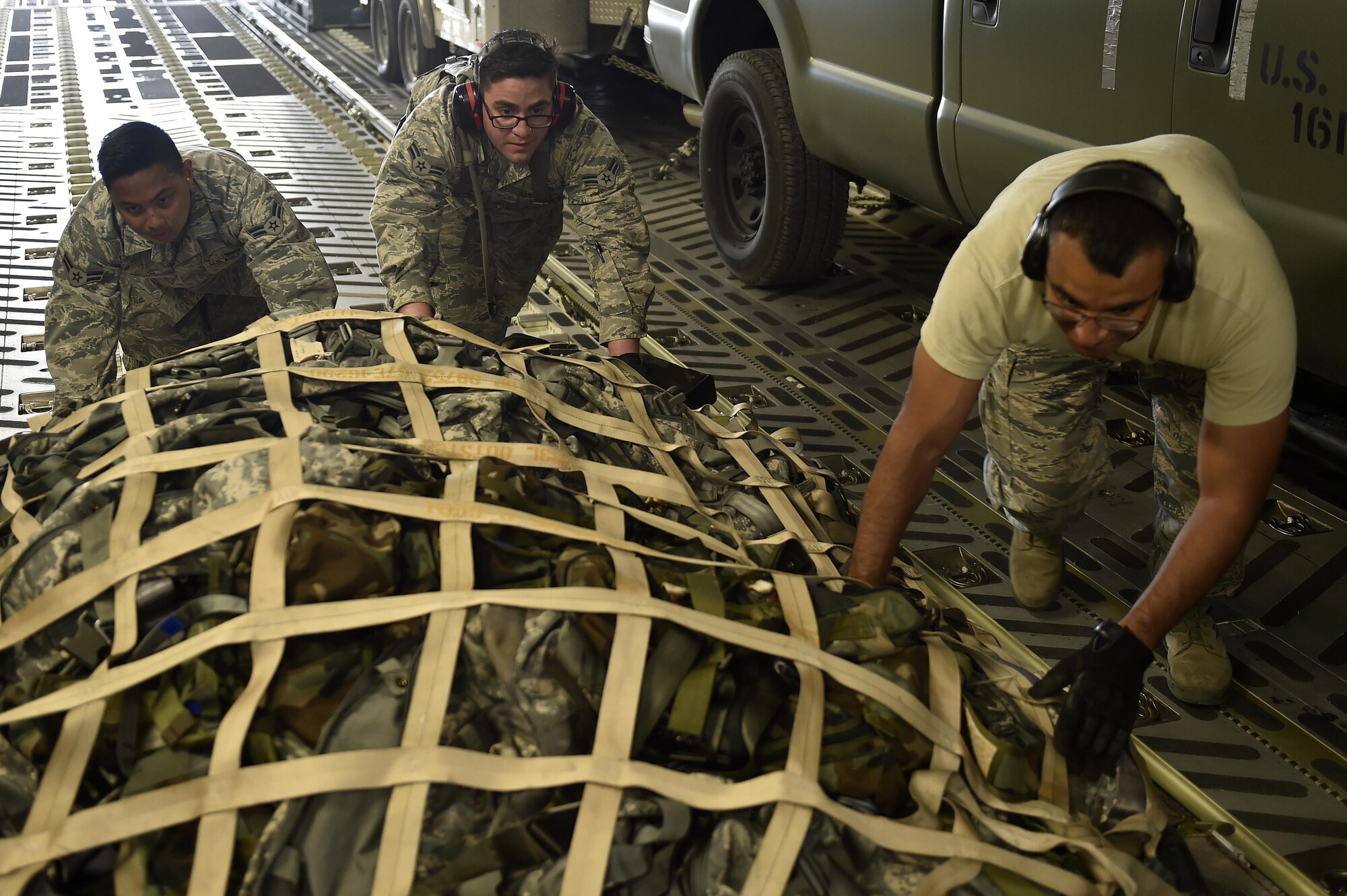 Aerial porters from the 321st Contingency Response Squadron position cargo on a C-17 Globemaster III aircraft during Exercise Saber Guardian ‘17 at Bezmer Air Base, Bulgaria, July 19, 2017.