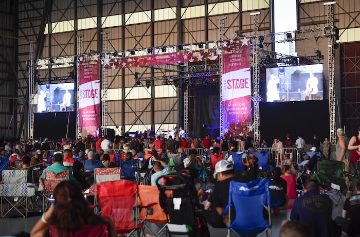 A crowd watches Thompson Square perform during Music Fest 2017 on the air base here July 29.