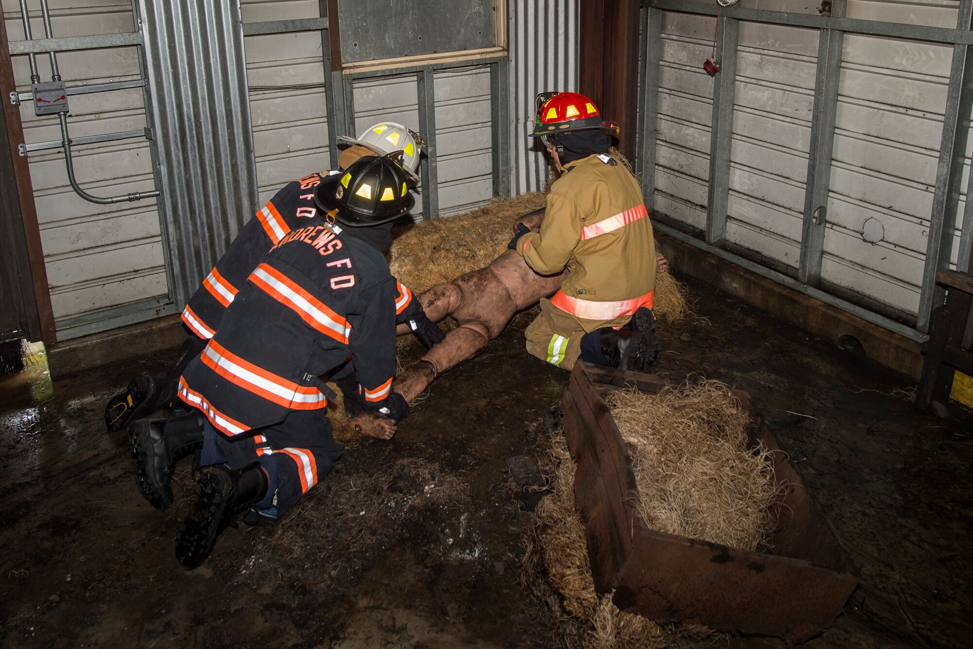 Joint Base Andrews Fire Explorer Academy cadets perform a search and rescue exercise during their evaluation.