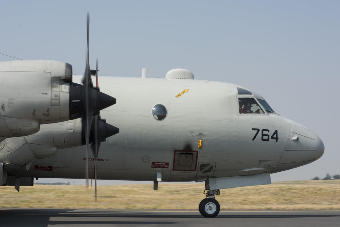 A Navy P-3 Orion patrol aircraft taxis in from a landing Aug. 2, 2017, at Fairchild Air Force Base, Washington. The Orion is a four-turboprop engine, anti-submarine and maritime surveillance aircraft developed for the Navy and introduced in 1962. (U.S. Air Force photo / Airman 1st Class Ryan Lackey)