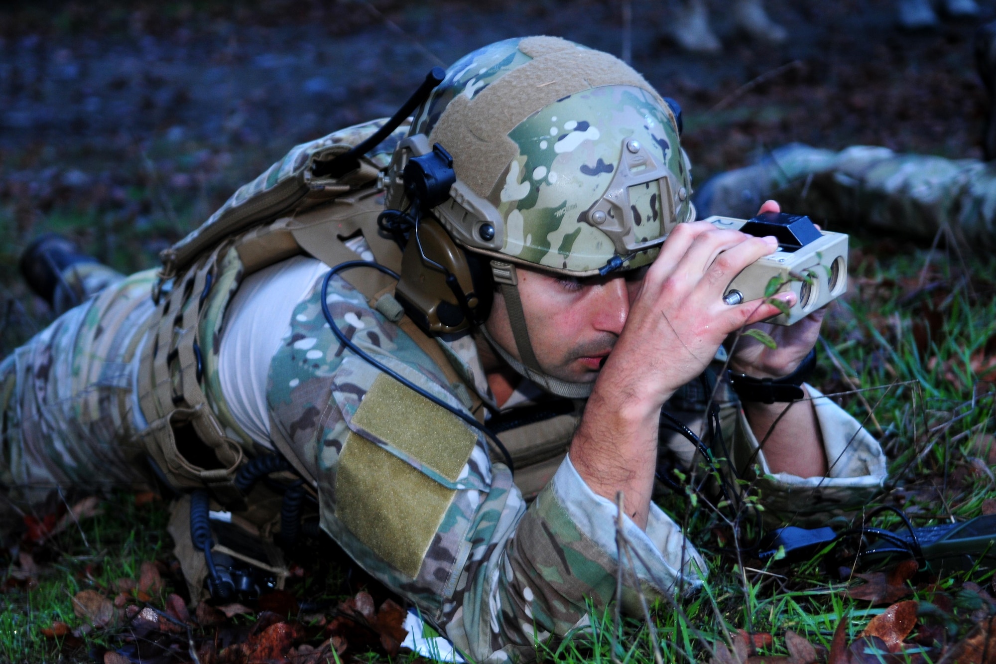 A tactical air control party specialist from the 116th Air Support Operations Squadron assesses the exercise battlefield during Exercise Cascade Warrior on Nov. 8 at Joint Base Lewis-McChord.