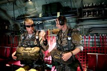 SERE specialists check personal equipment